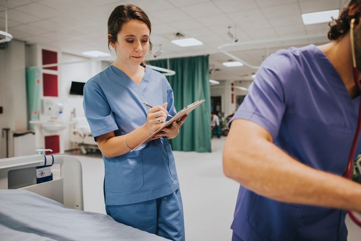 A nurse refers to an AFib nursing care plan while working in the ER.