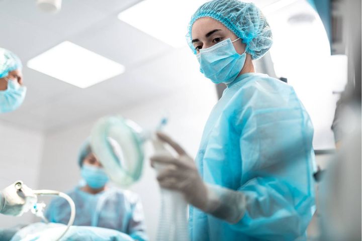 A nurse uses her cath lab nurse resume skills.