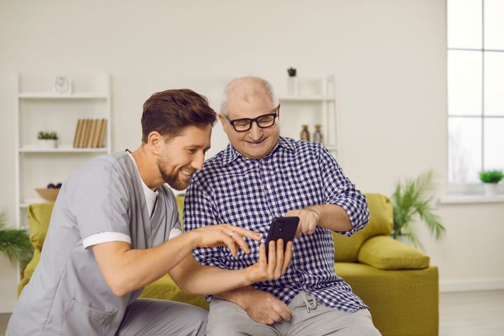 A nurse uses one of his favorite clinic resources to help a patient prepare for his aftercare.