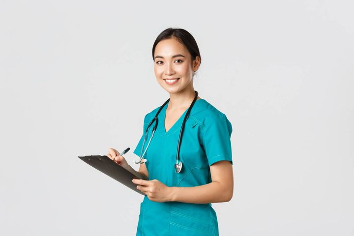 A nurse works on her CT nursing license renewal.