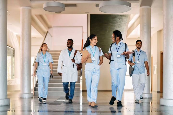 A group of nursing students discusses getting grants for nursing school.