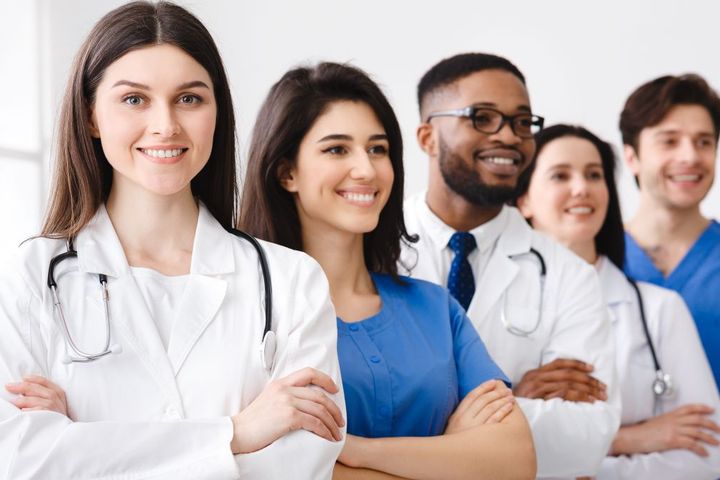 Members of a hospital's staff pose for the camera.