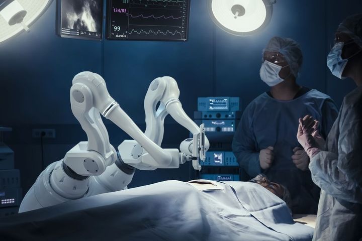 A surgical robot prepares for a procedure -- just one example of healthcare workflow automation.