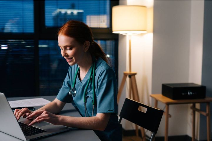 A nursing assistant researches how to become an RN in Washington State.
