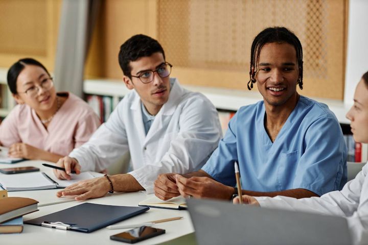 Nursing students study Martha Rogers' nursing theory.