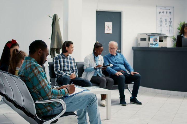 Hospital patients in the waiting room.