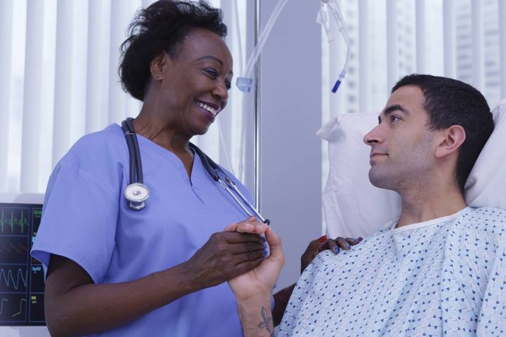 A nurse provides compassionate care that displays why nursing tops the rankings for the most trusted professions.