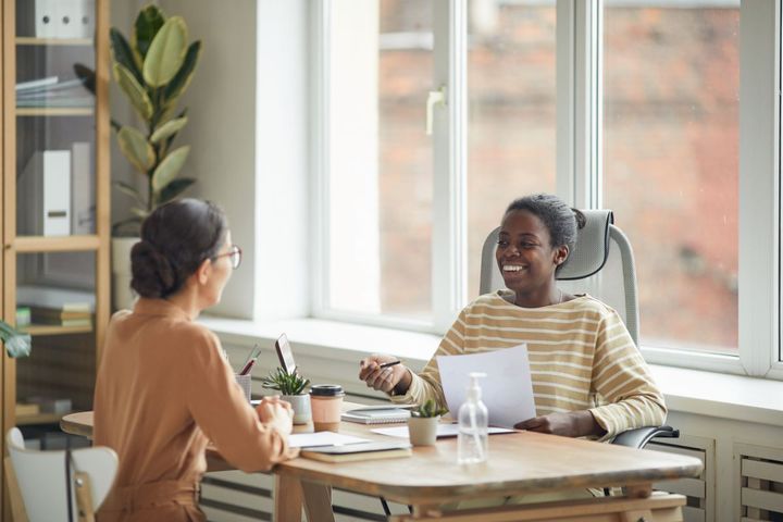 A nurse recruiter interviewing a job candidate.