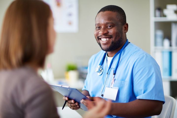 Nurse with stethoscope and pen