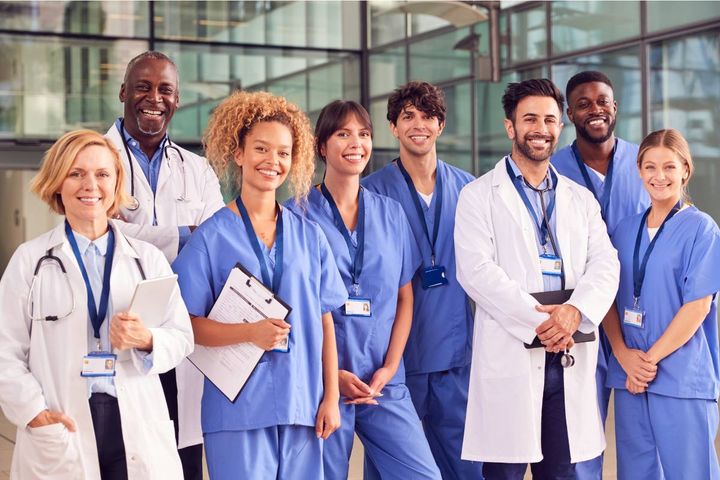 A group of nurses celebrate Nurses Week with their unit at a hospital.