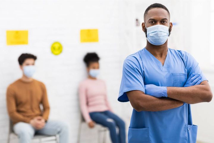 An occupational health nurse practitioner manages a workplace clinic.