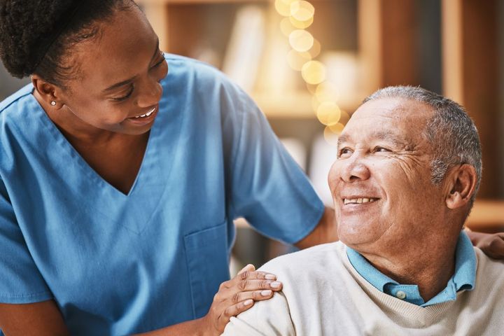 A nurse shares a moment with one of her patients.