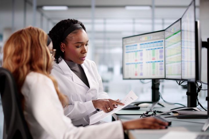 Physicians prepare for a release of information for a patient.