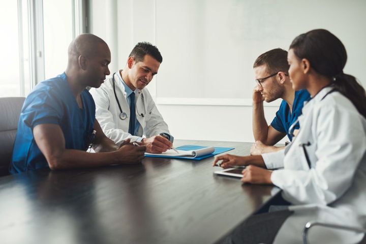 Nurses and physicians sit down together for a Schwartz round.