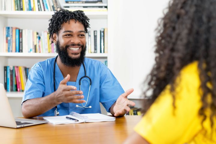 A nurse manager uses a skills profile during an interview with a prospective new hire.
