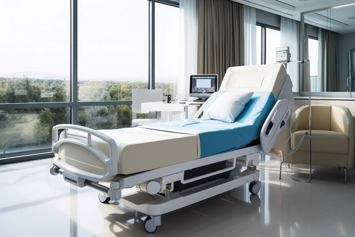 A smart hospital bed, unoccupied.