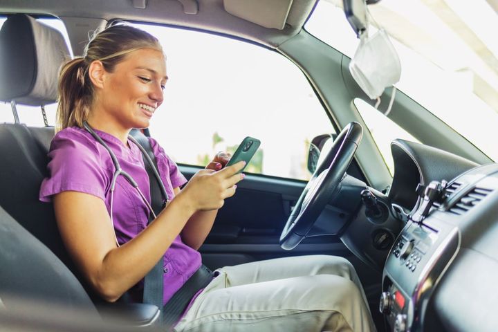 A travel nurse checks the address for her next visit.