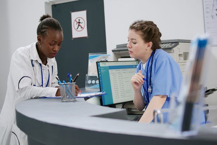 A physician and a nurse discuss ways to improve quality at their facility.