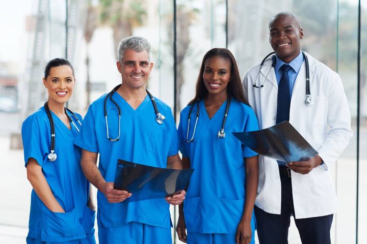 A group of nurses and a doctor discuss their answers to the question, Why did you choose nursing as a career?