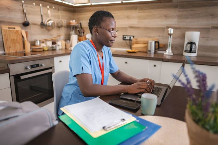 An NP researches the best work-from-home nurse practitioner jobs.