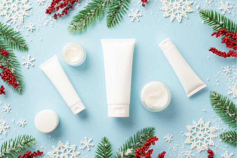 Hand cream gift set against a holiday backdrop.