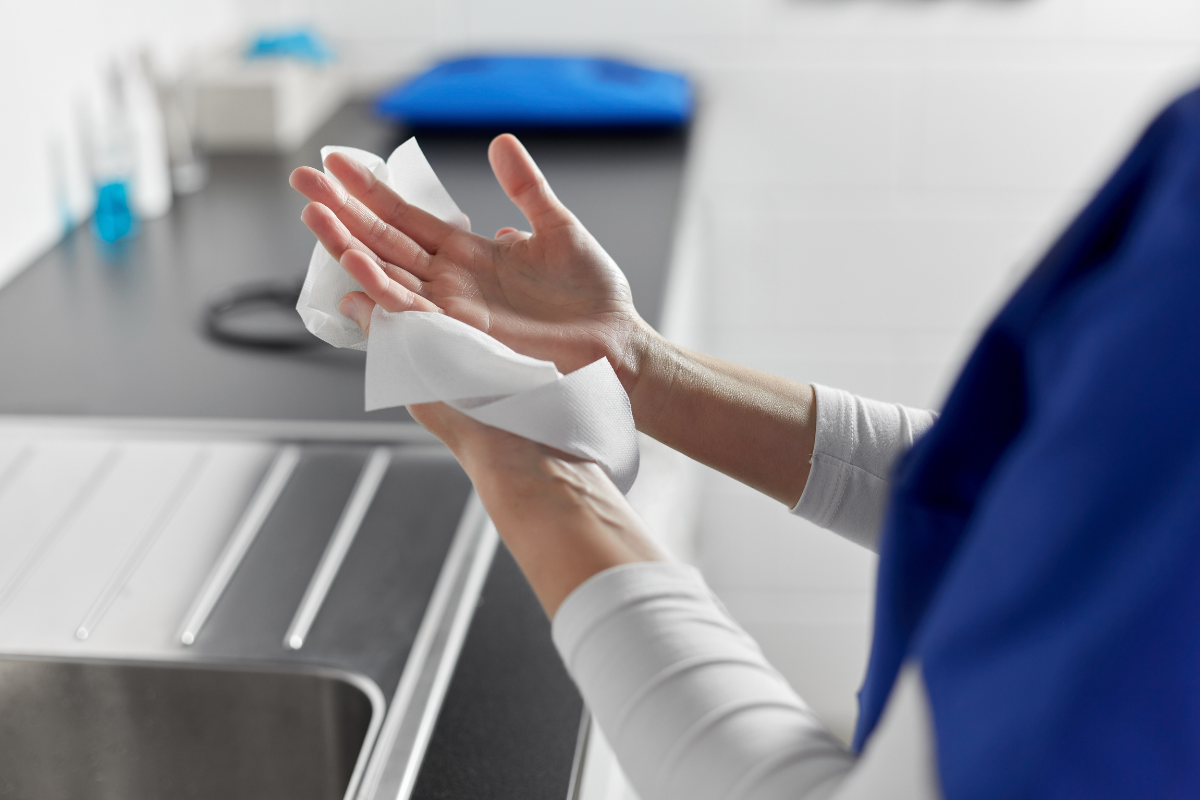 A nurse preps their hands before using the best hand lotion for nurses.
