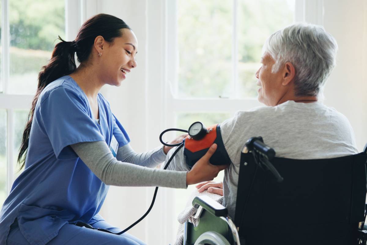 A nurse speaks with a patient about the role of bioethics in nursing practice.