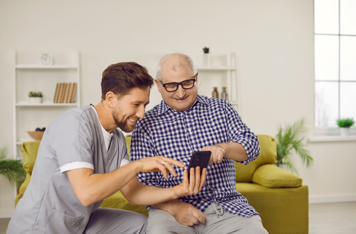 A nurse uses one of his favorite clinic resources to help a patient prepare for his aftercare.