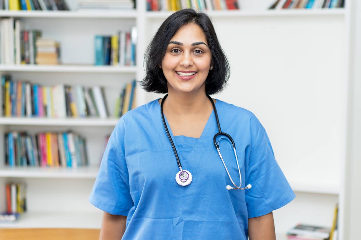 A nurse with CMSRN certification preapres for her next shift.