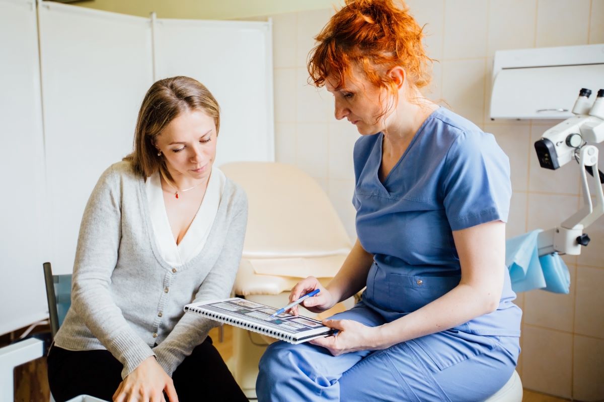 A nurse goes over the discharge plan with one of her patients.