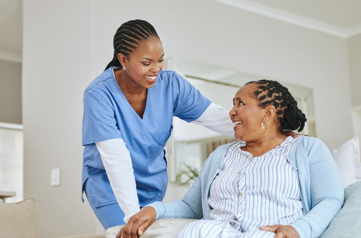 A nurse shares a moment with one of her patients.