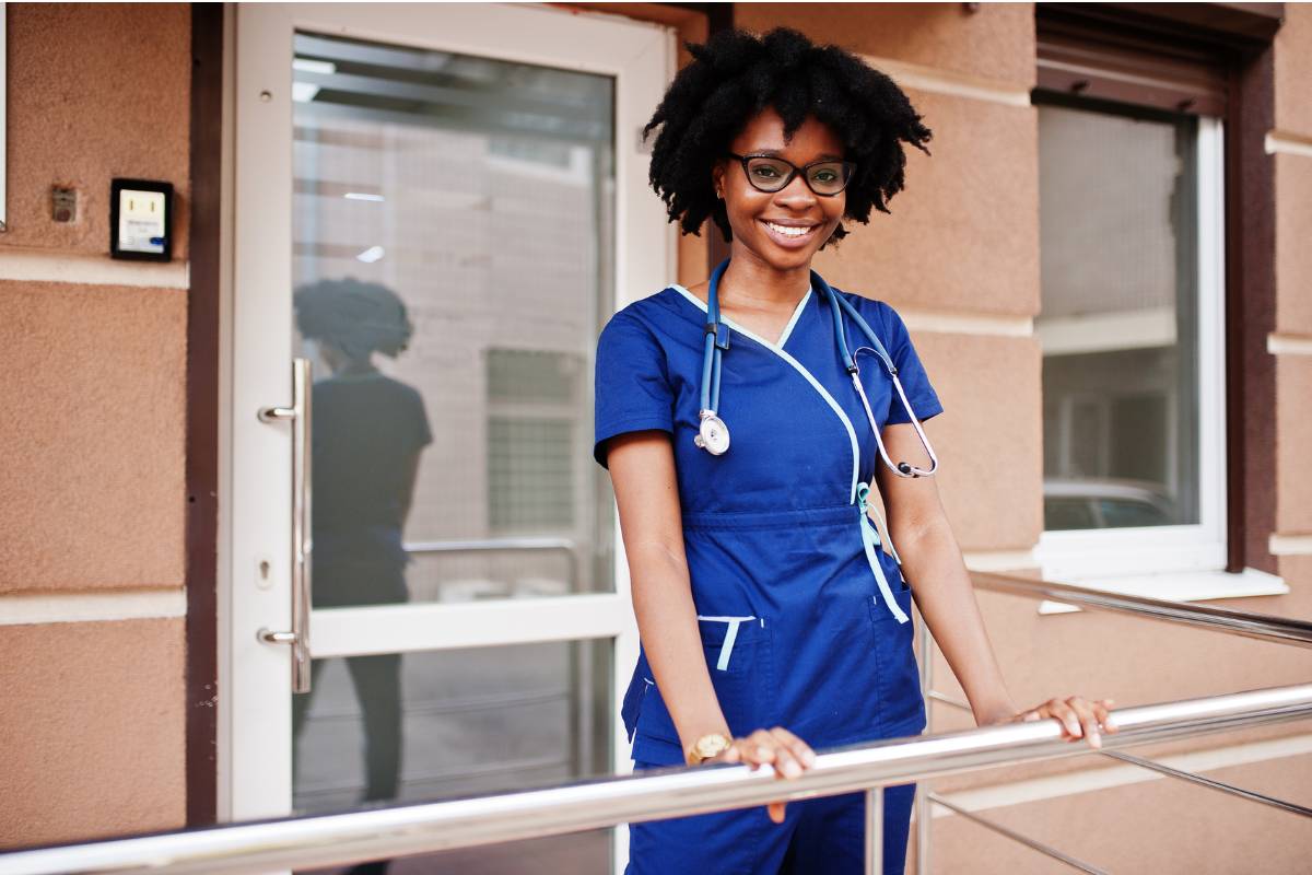 A nurse poses for a photo while discussing how to become an RN in Maryland.