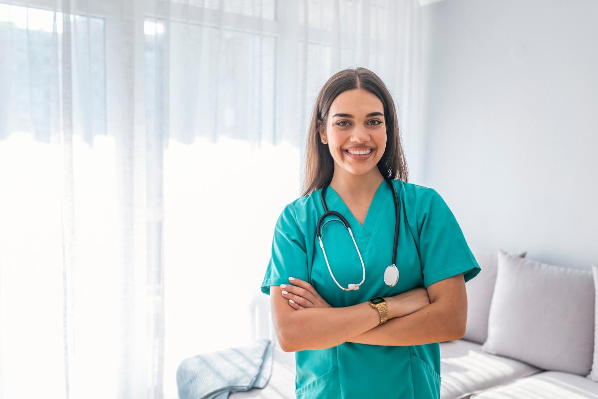 A nurse poses for a photo while discussing how to become an RN in Texas.