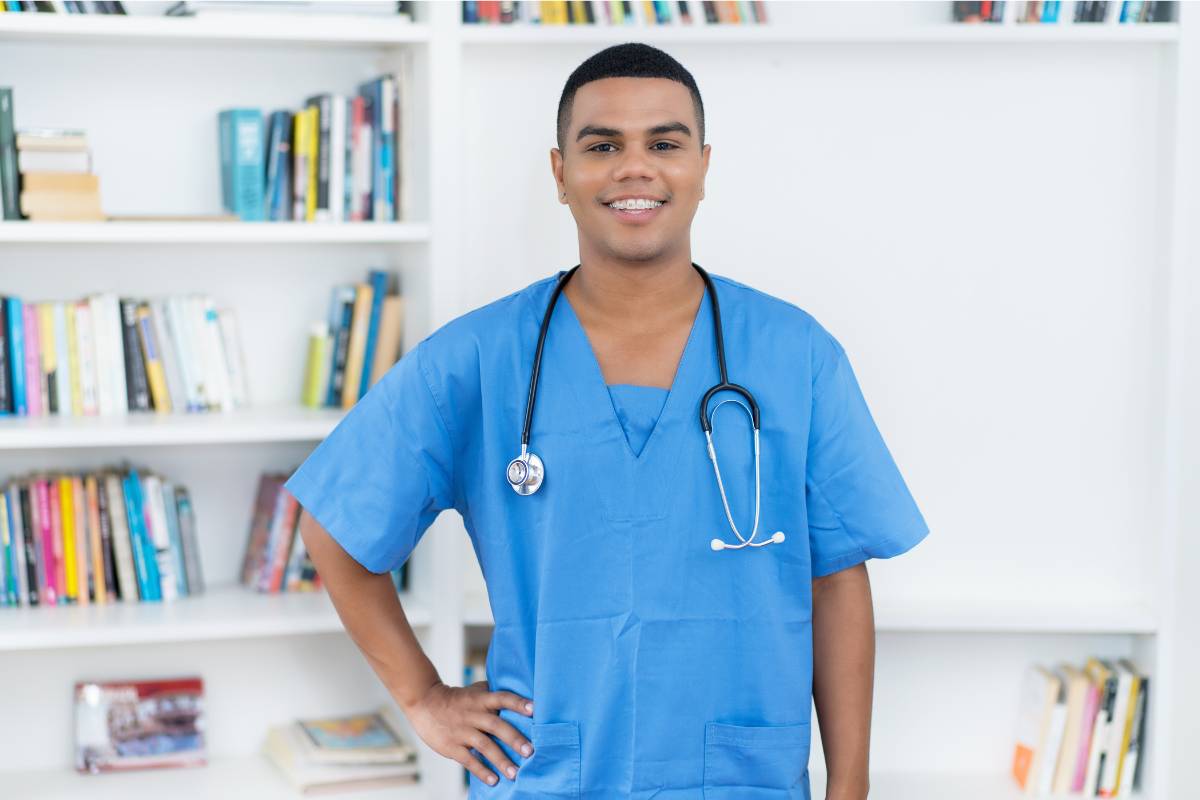 A nurse poses for a photo while discussing how to become an RN in Virginia.