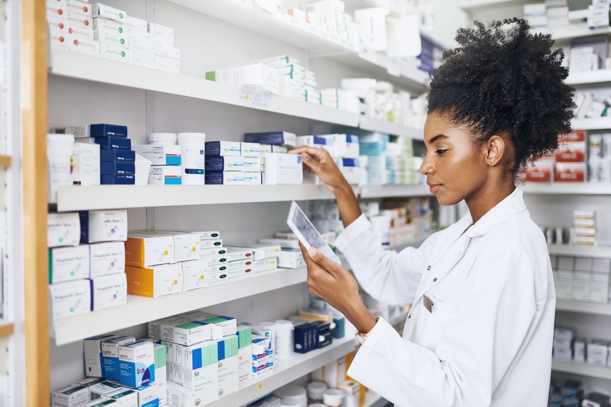 A healthcare worker checks medical stocks as part of her hospital's just in time inventory management scheme.