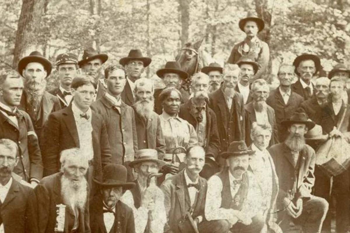 Lucy Higgs Nichols stands with Union soldiers.