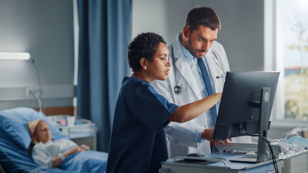 A nurse and physician conduct a national NPI registry search.