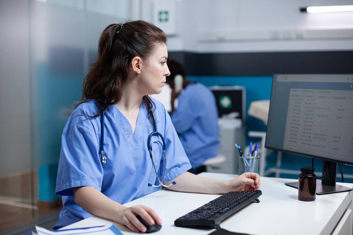 A nurse works on her Nevada board of nursing license renewal.