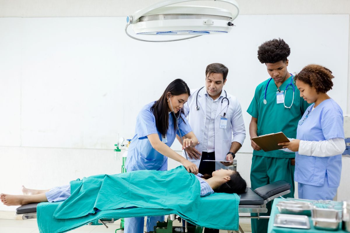 Two prospective nurses engage in a nurse job shadowing program.