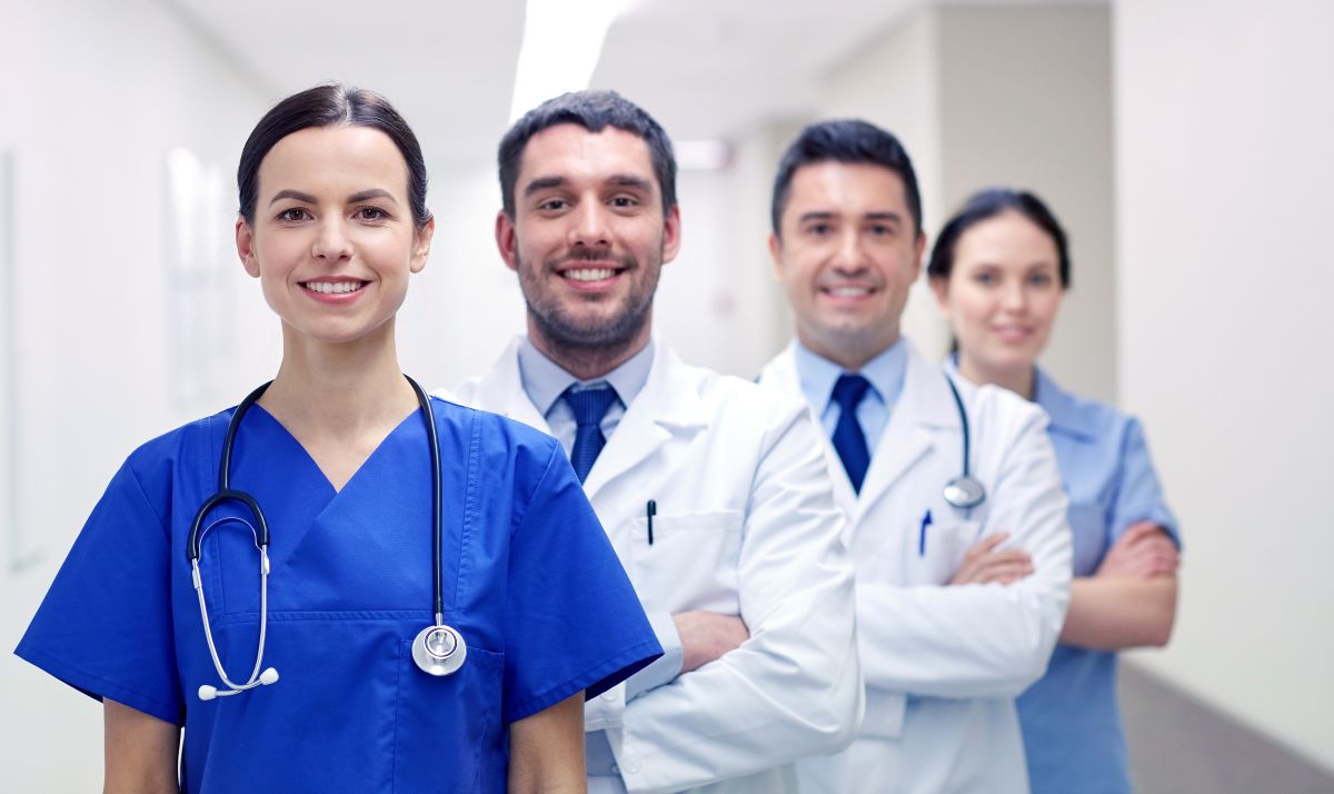 Nurses and clinicians smiling in a medical facility