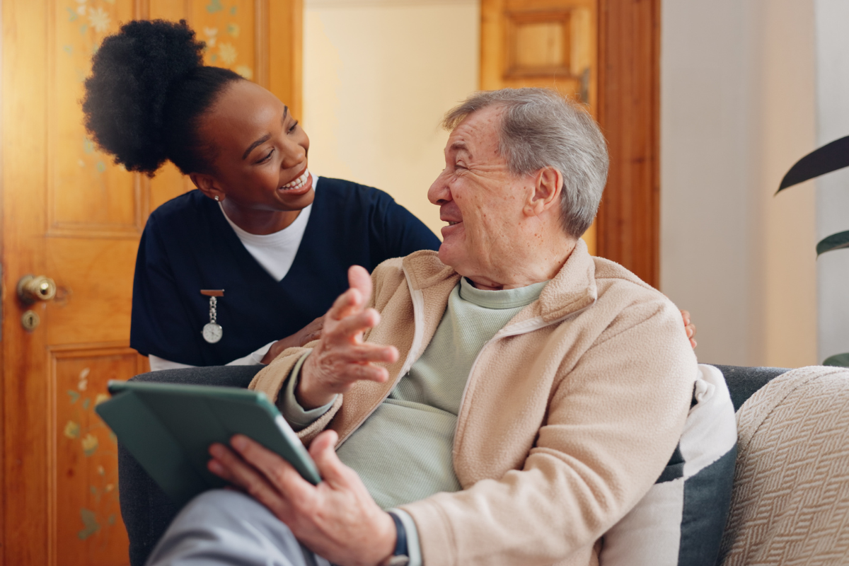 A nurse reviews the goals of her nursing care plan for COPD with a patient.