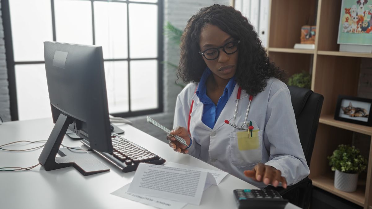 A patient care coordinator looks up information for a patient.