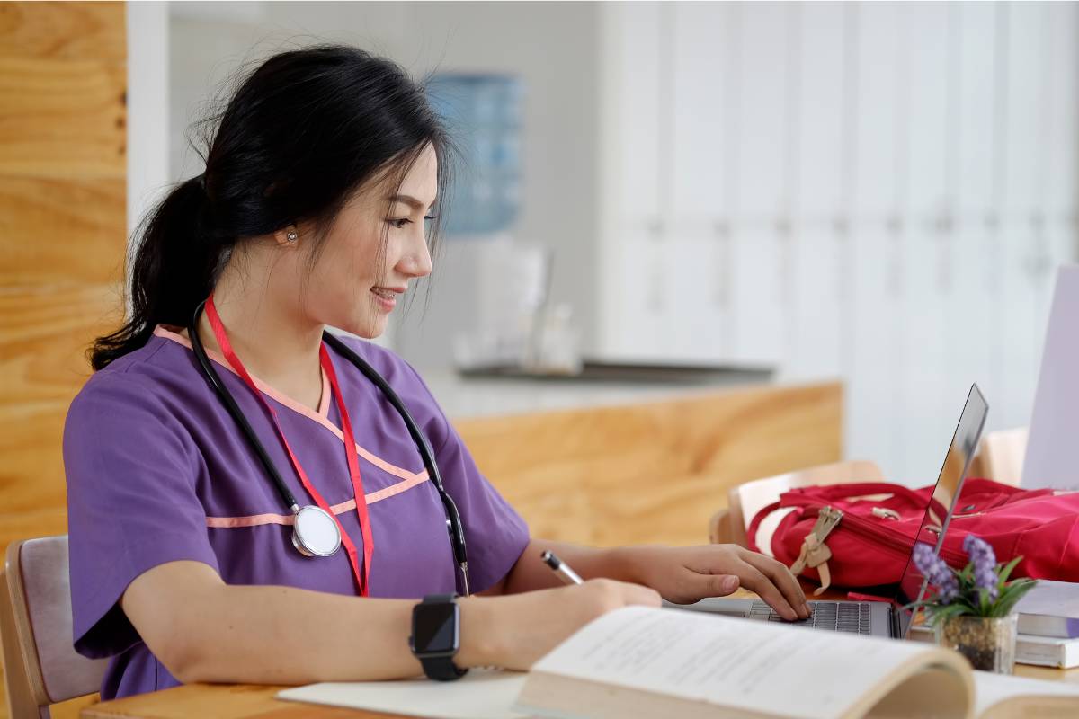 A nursing student studies the VEAL CHOP nursing mnemonic before a test.